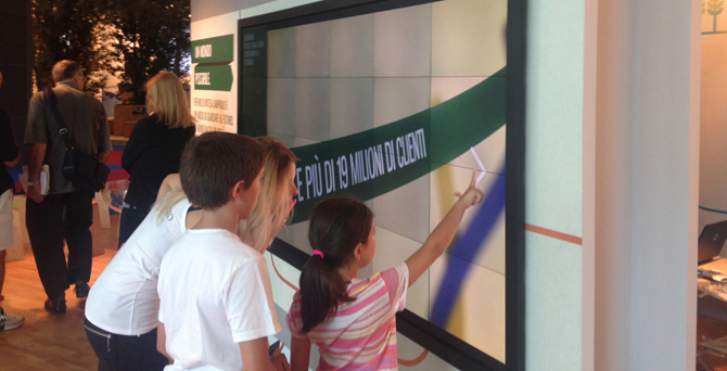 Children playing the MicroTiles™ video wall